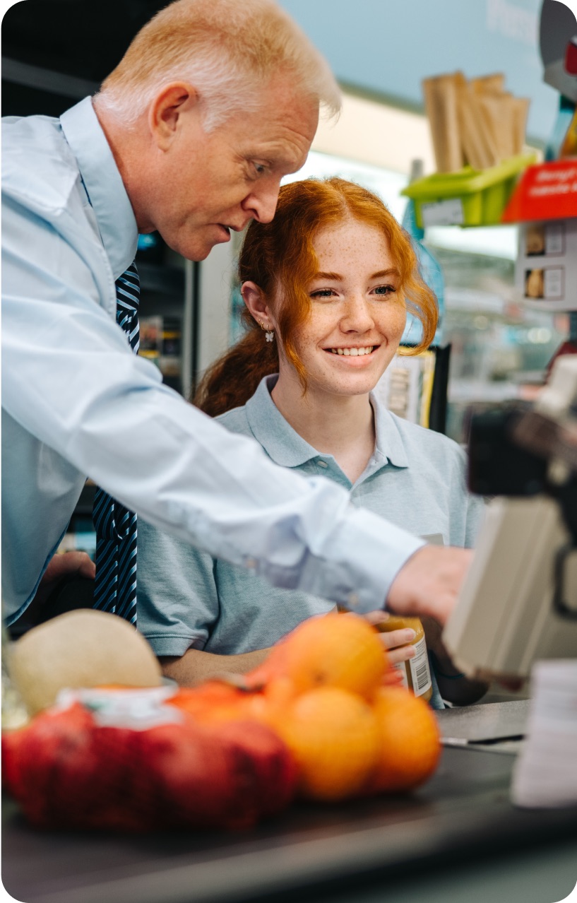 Student engaging with community members, highlighting education and community connection